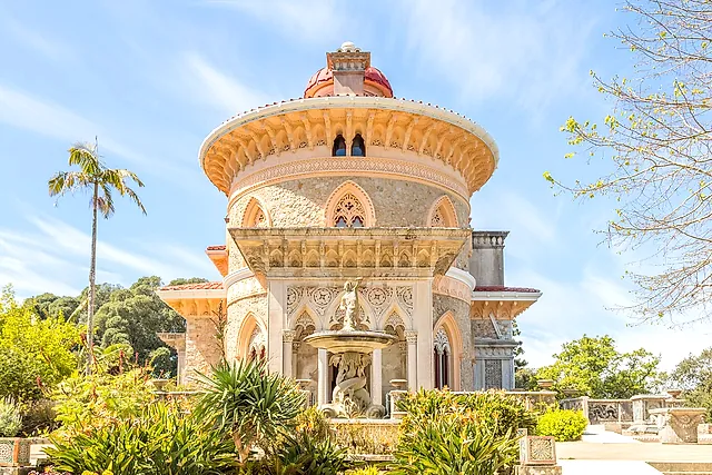 The Moorish-style façade of Monserrate Palace, with its domed rotunda and fountain under a blue sky